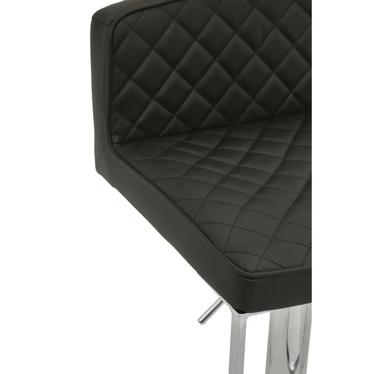 Black quilted dining chair with chrome legs, close-up of seat and backrest