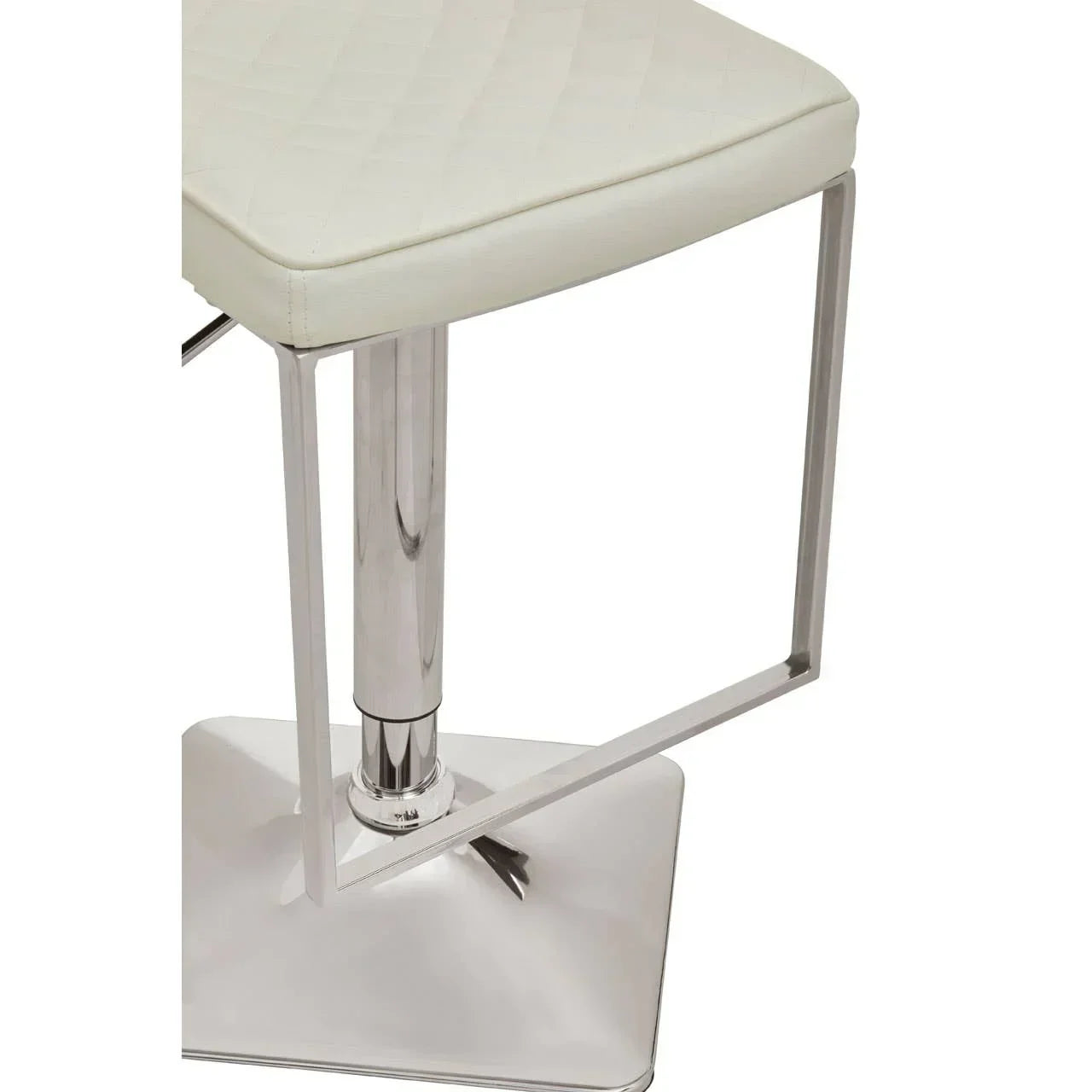 Cream bar stool with chrome frame and quilted seat, close-up of base and footrest