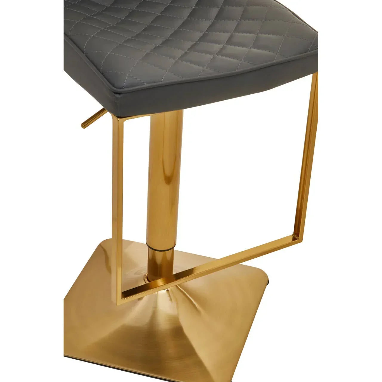 Grey quilted bar stool seat with gold metal frame and square base closeup