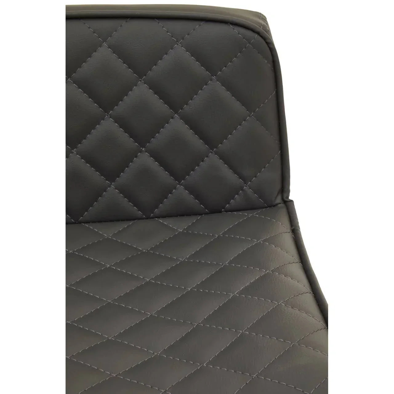 Close view of black quilted dining chair seat and backrest with diamond stitching detail