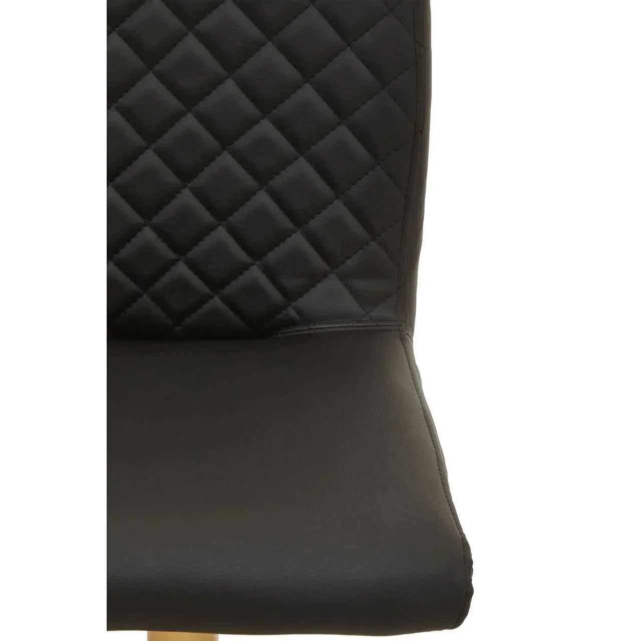 Black faux leather dining chair with quilted backrest and wooden leg detail