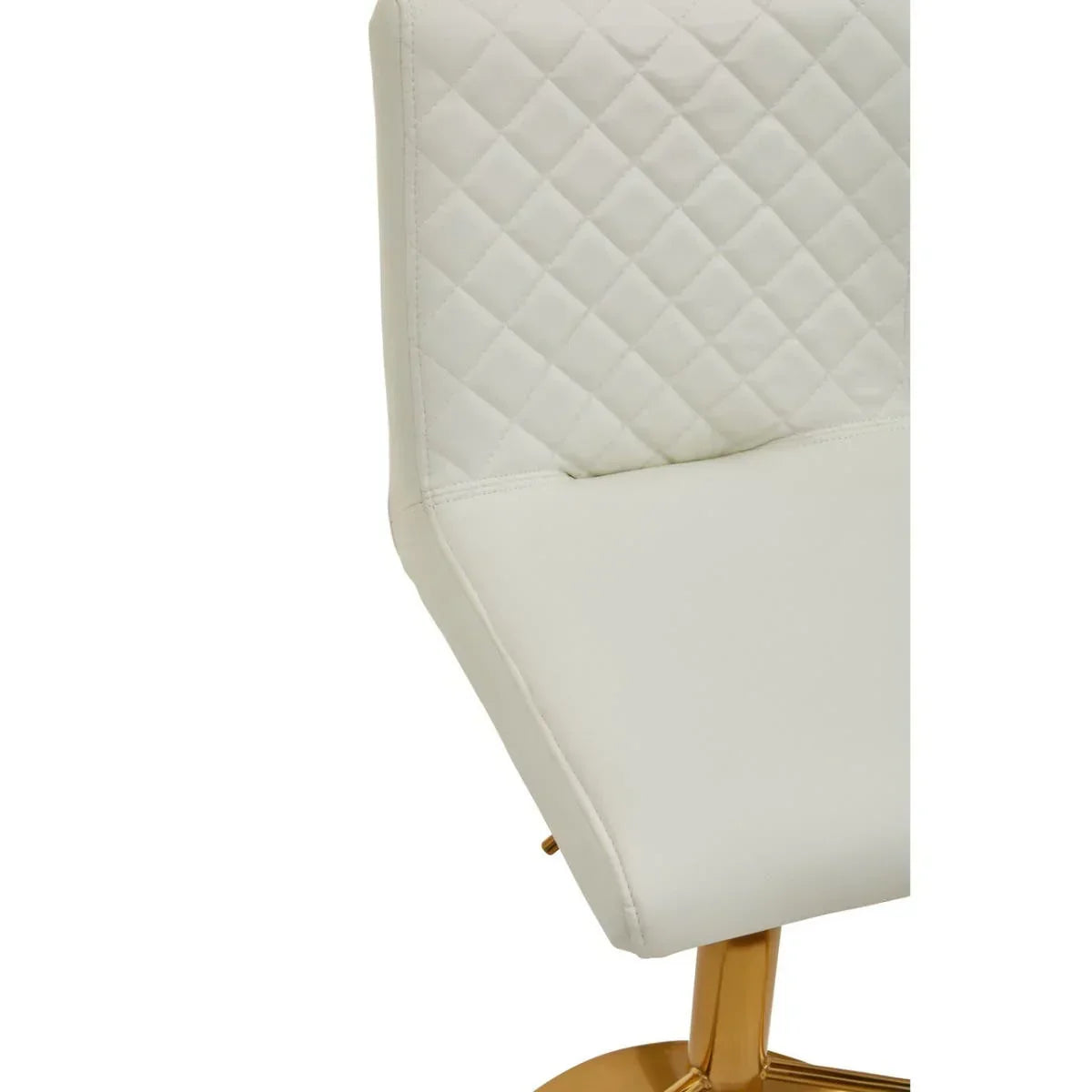 Cream faux leather dining chair with quilted backrest and gold metal base, side angle