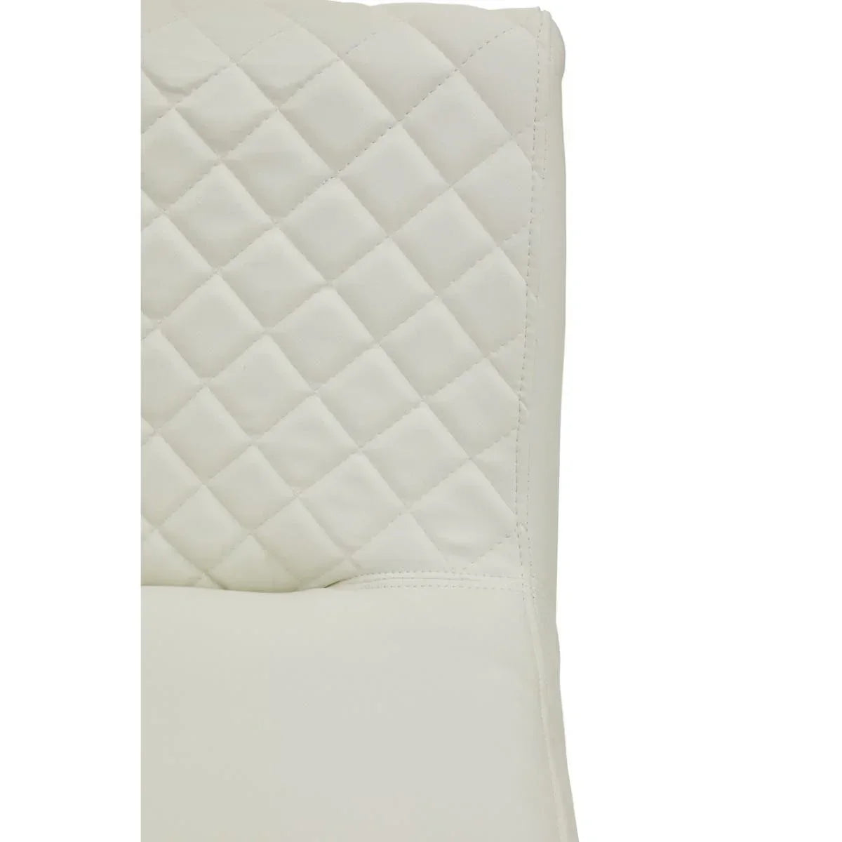 Close up of cream dining chair with quilted faux leather backrest