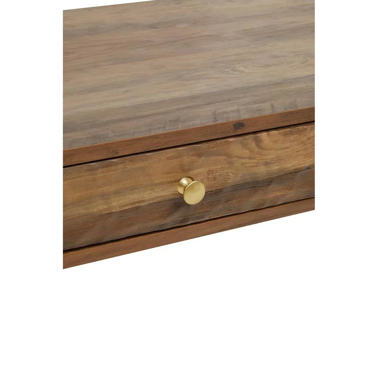 Wooden drawer front with gold metal handle, close-up of furniture detail