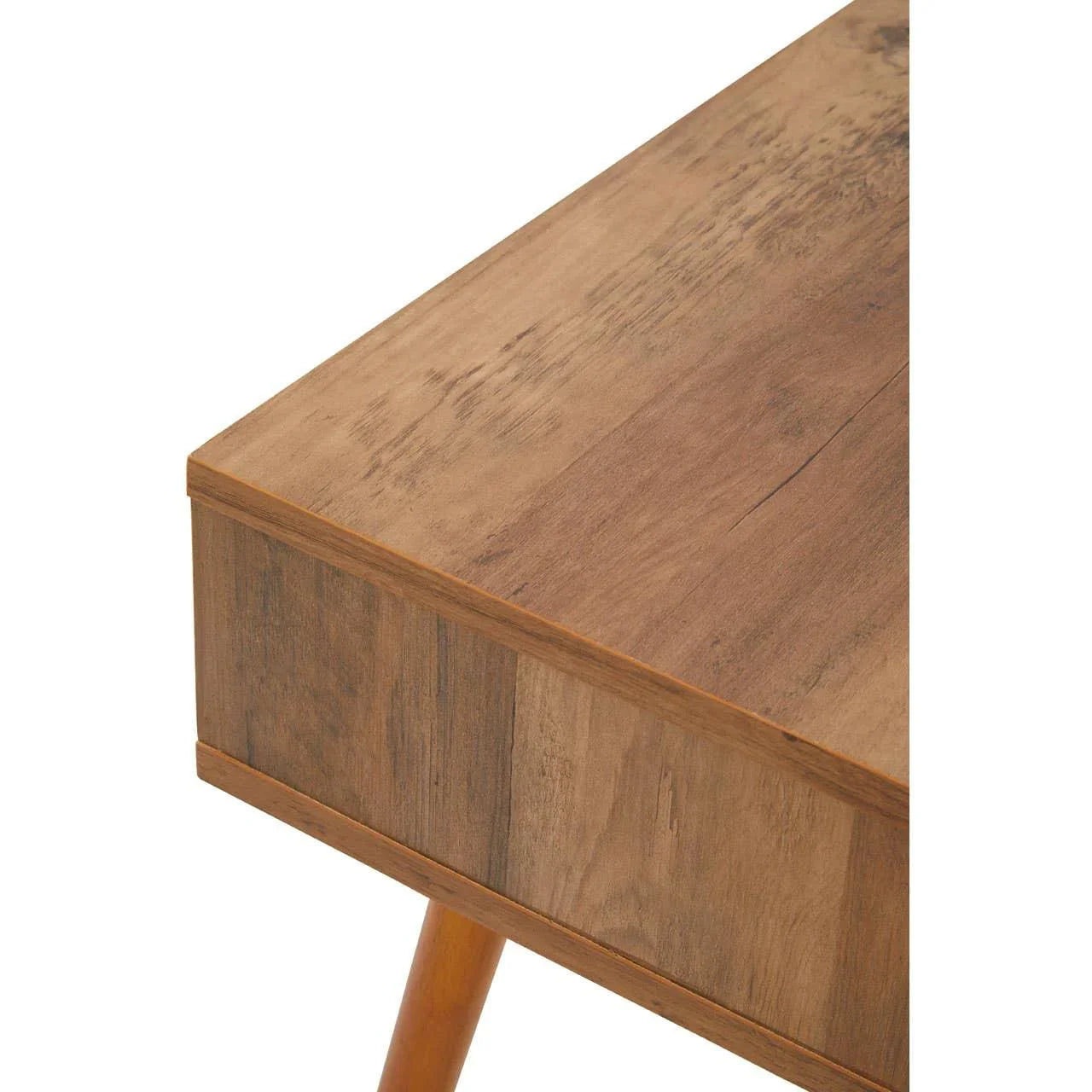 Closeup of wooden coffee table with tapered legs and natural wood grain finish
