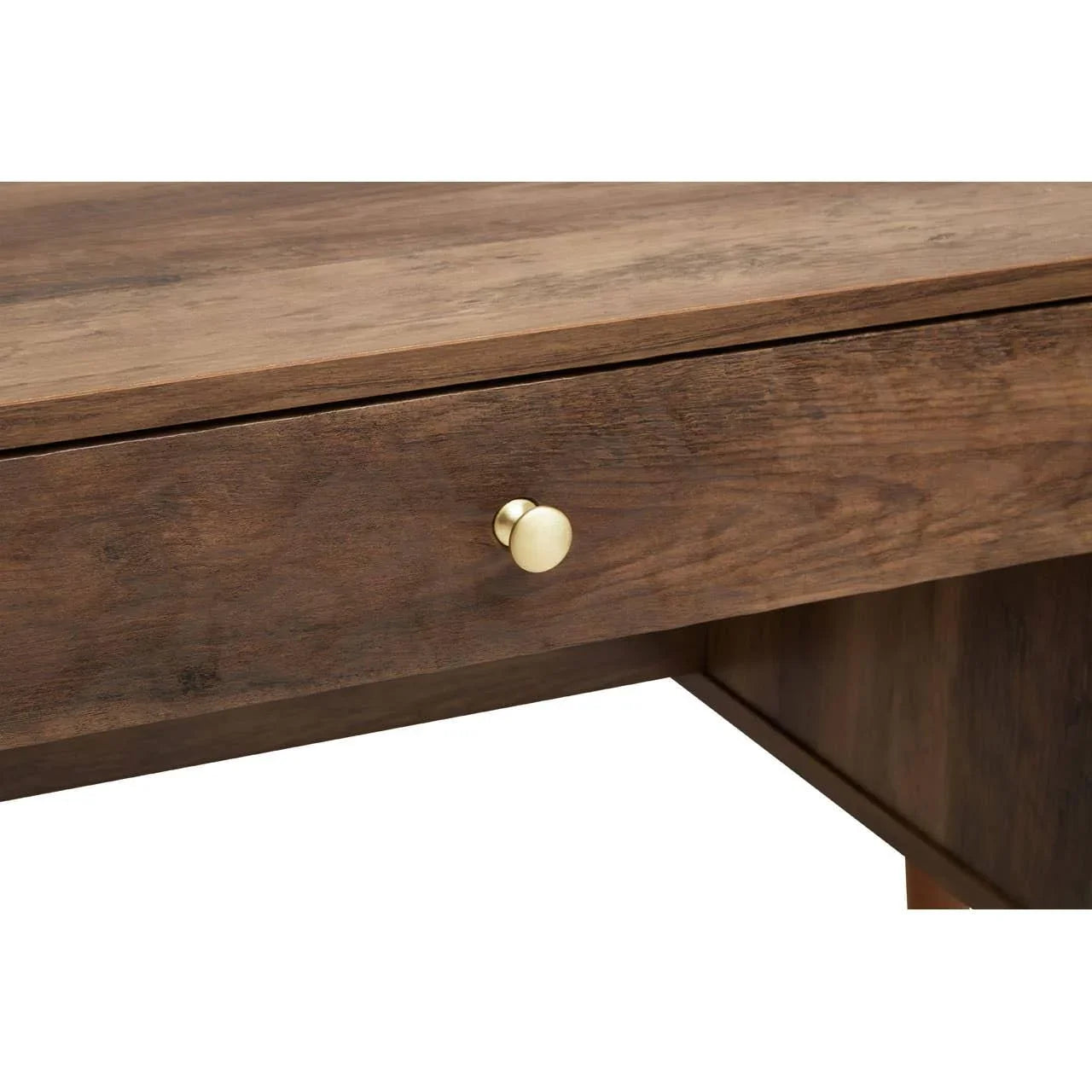 Closeup of wooden desk drawer with gold knob handle and natural grain finish