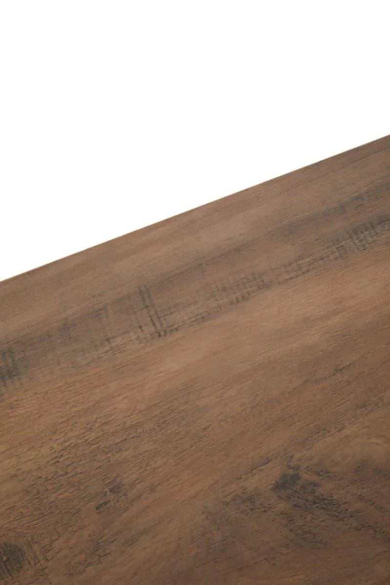 Closeup of wooden dining table surface showing natural grain and rustic texture