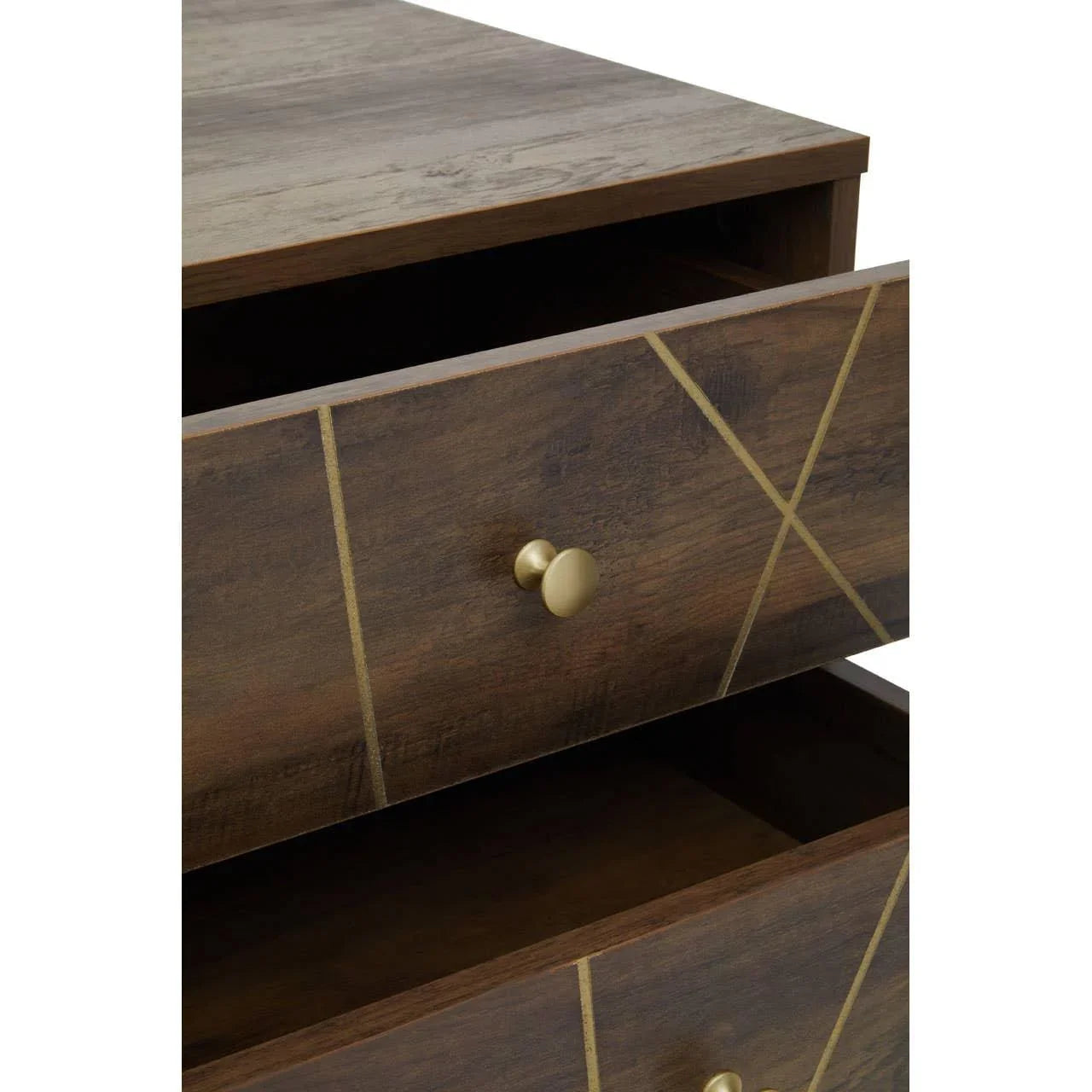 Wooden chest of drawers with gold handles and geometric gold line accents, close-up view