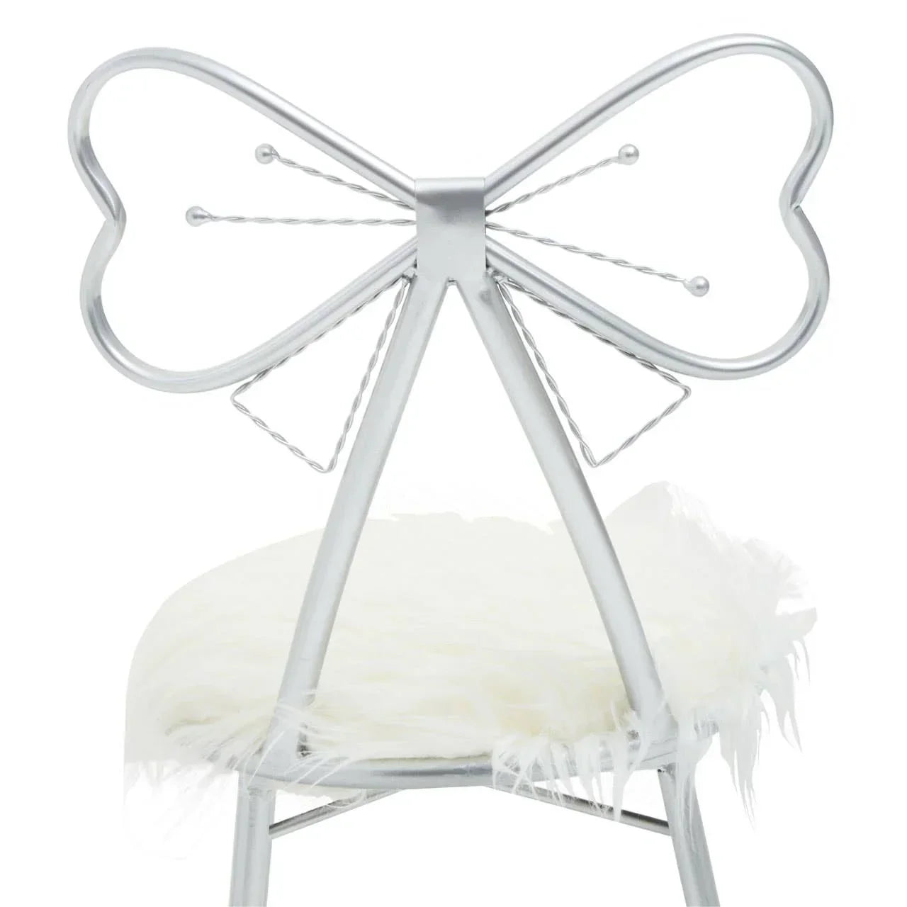 Silver metal chair with heart shaped backrest and white faux fur seat cushion