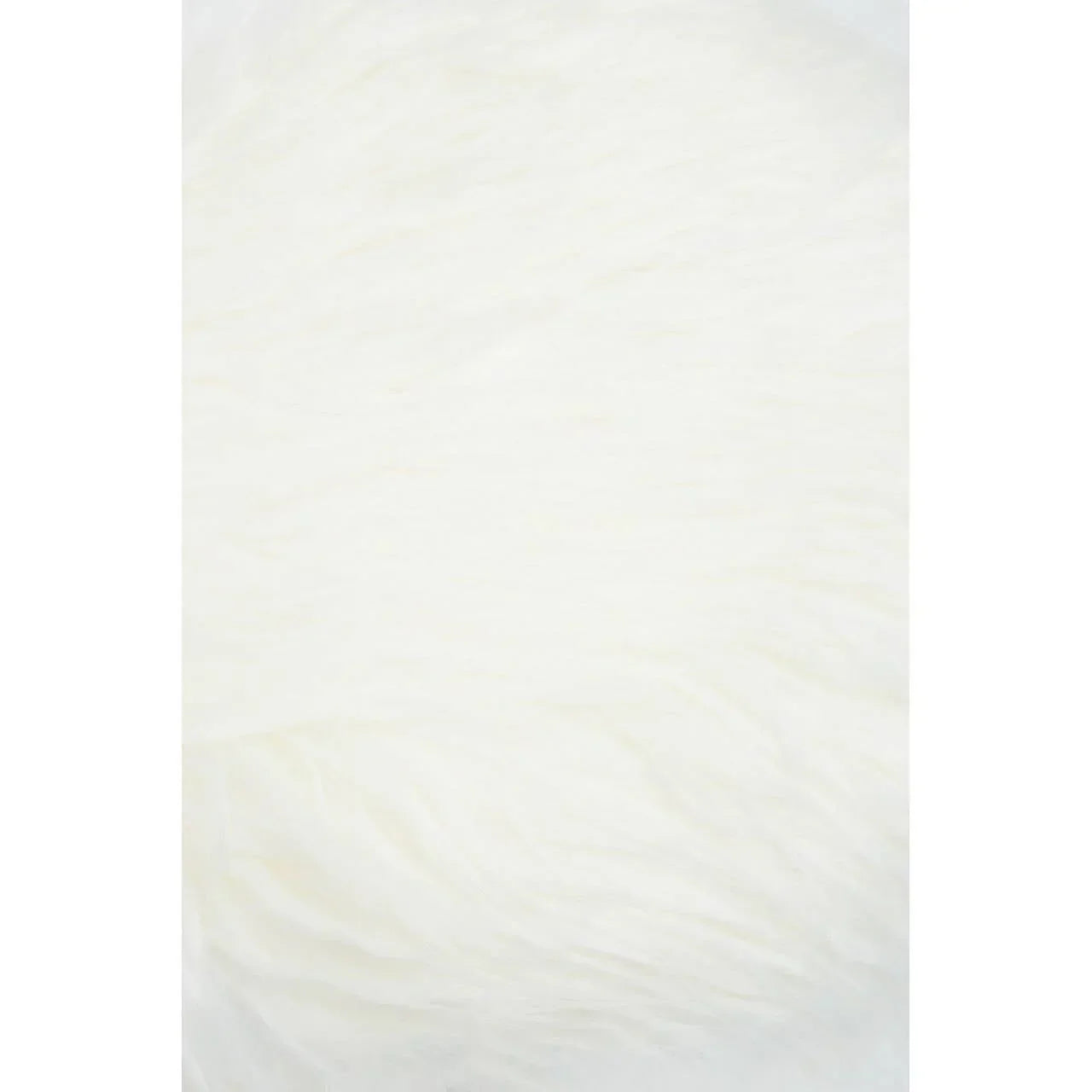close up of white faux fur rug texture
