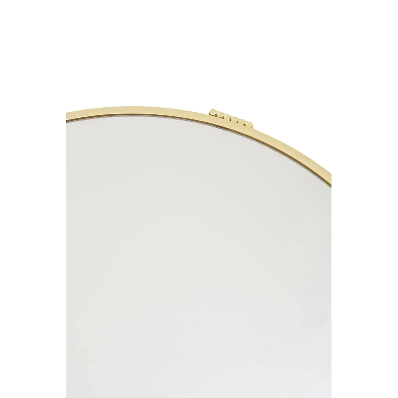 Gold metal framed wall mirror with decorative accent, close-up top view