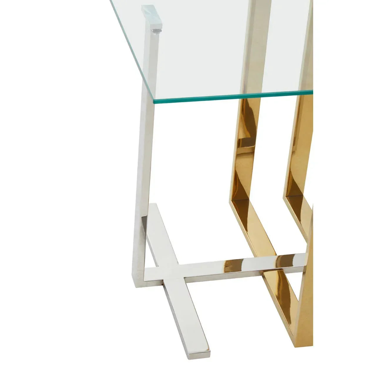 Glass top table with chrome and gold metal legs, close-up of base and support design