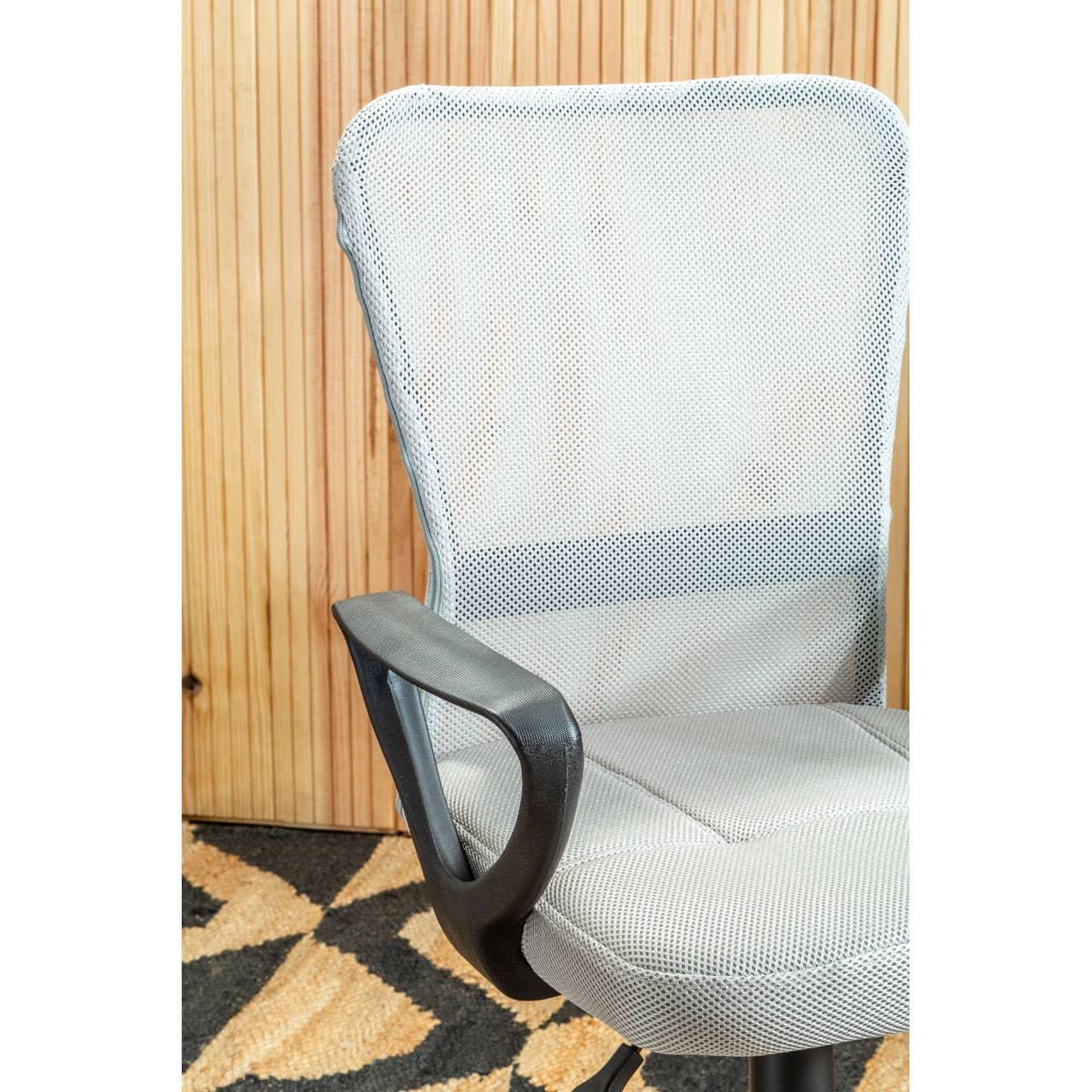 Grey mesh office chair with black armrest and ergonomic backrest on patterned rug