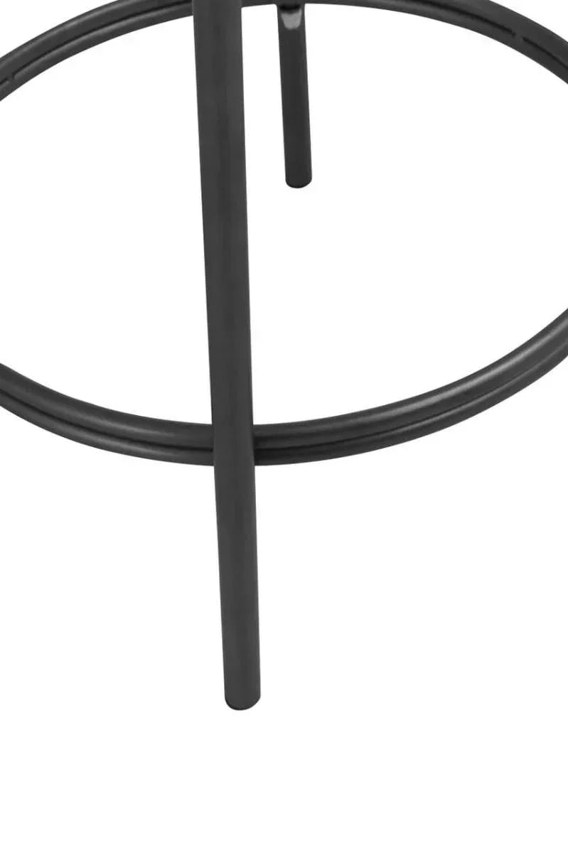 Black metal bar stool leg with circular footrest, close up view