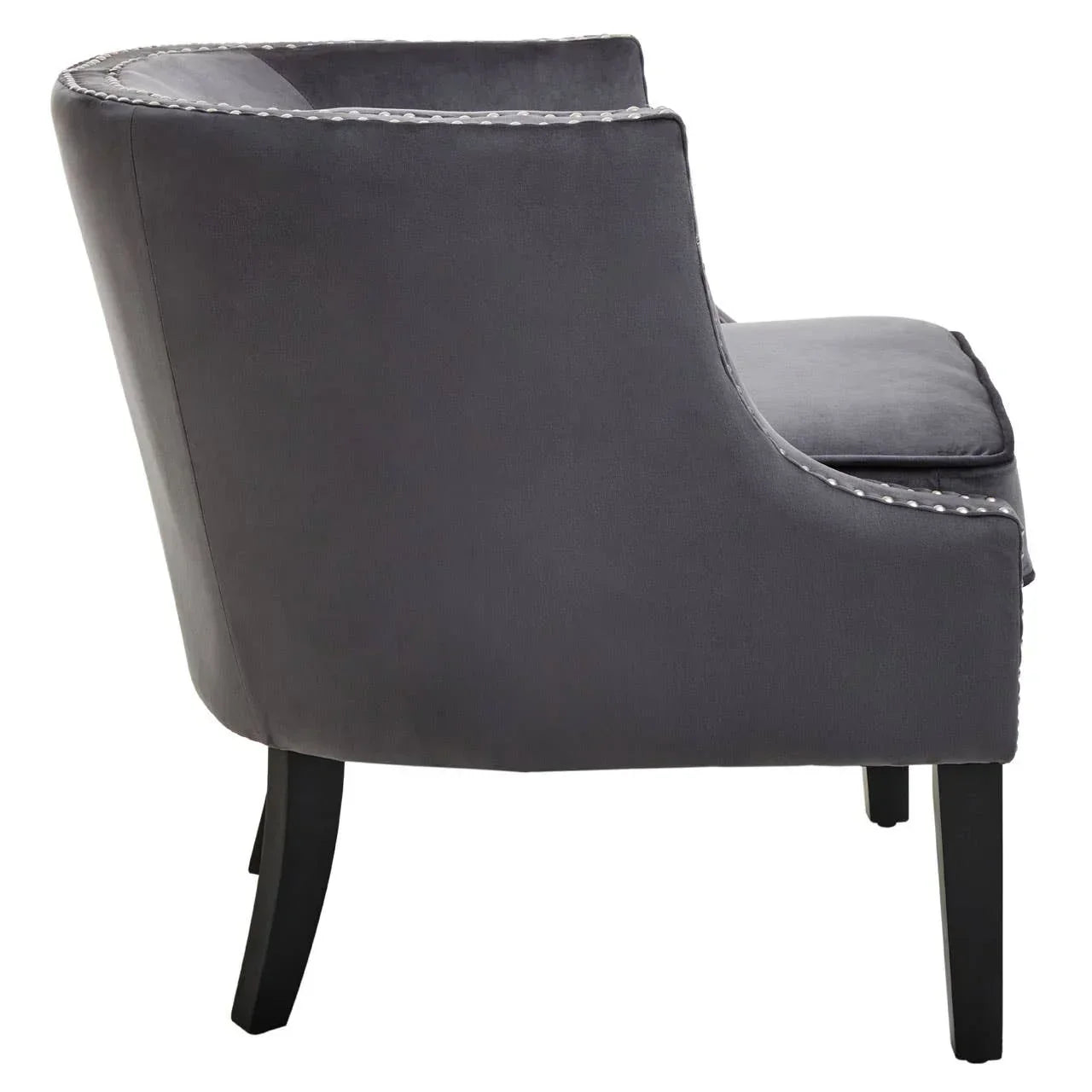 Side view of dark grey fabric accent chair with silver stud edge and black legs