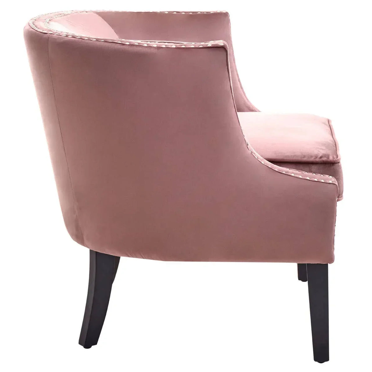 Blush velvet accent chair with curved back and black tapered legs, side view