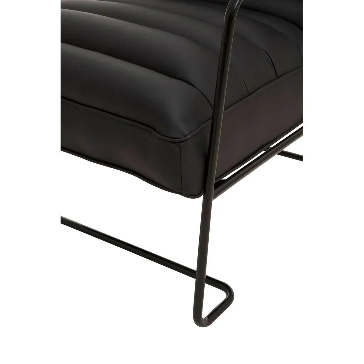 Black leather accent chair with metal frame and ribbed cushion detail, side closeup view