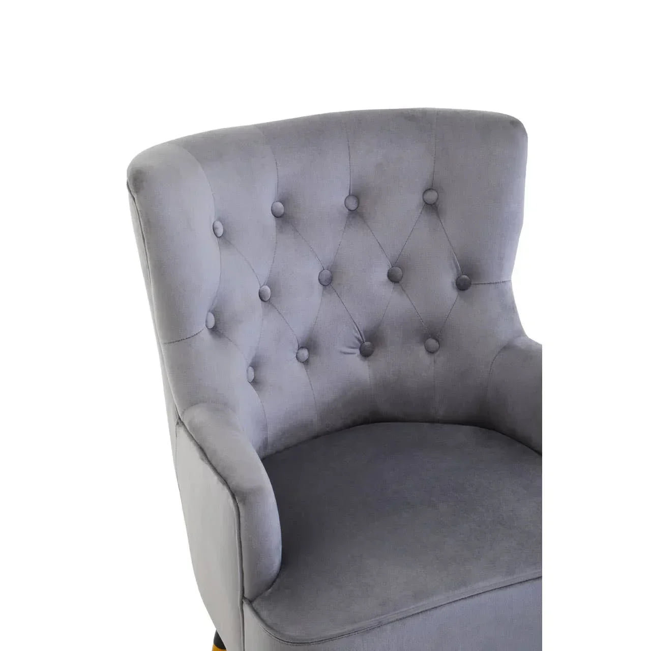 Grey upholstered accent chair with button tufted backrest, close-up front view