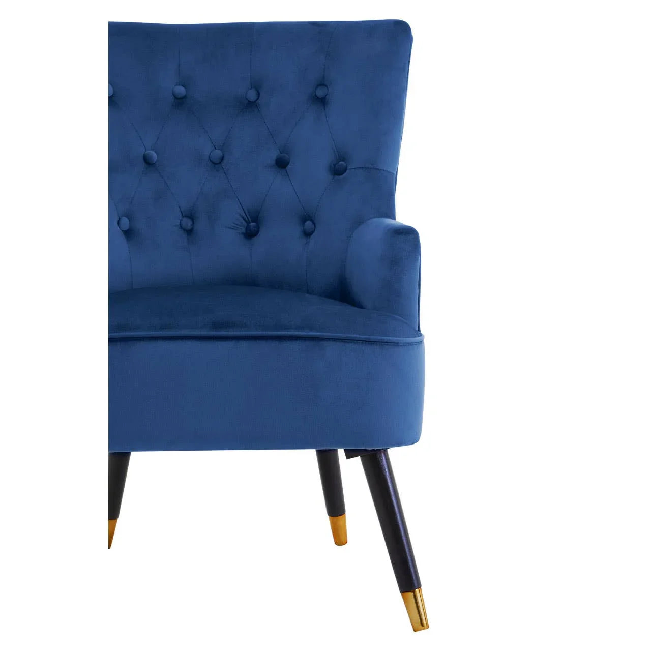 Blue velvet accent chair with button backrest and gold-tipped dark wooden legs, front angle