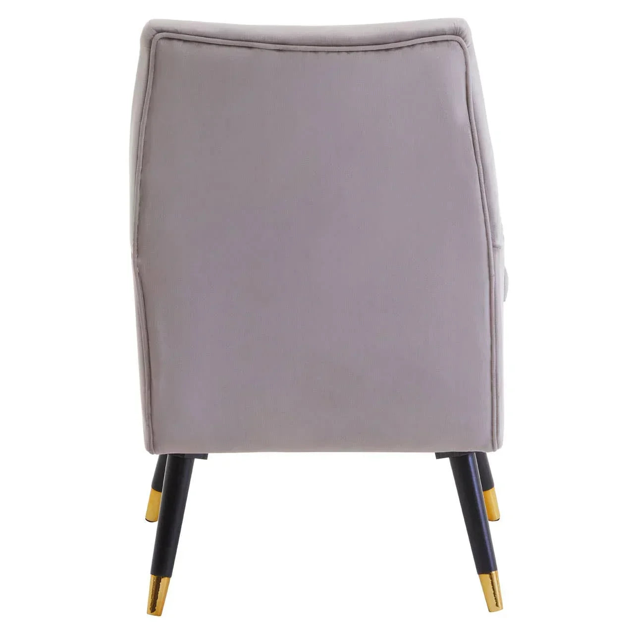 Grey velvet accent chair rear view with gold-tipped black legs
