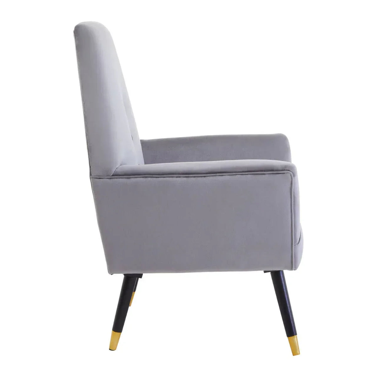 Side view of grey accent chair with slim black gold-tipped legs and padded armrest