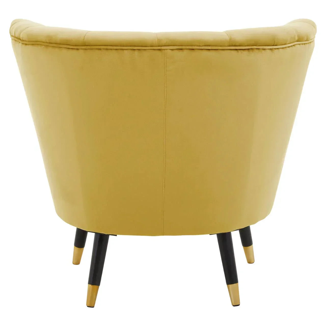 Yellow velvet accent chair rear view with tapered black and gold legs
