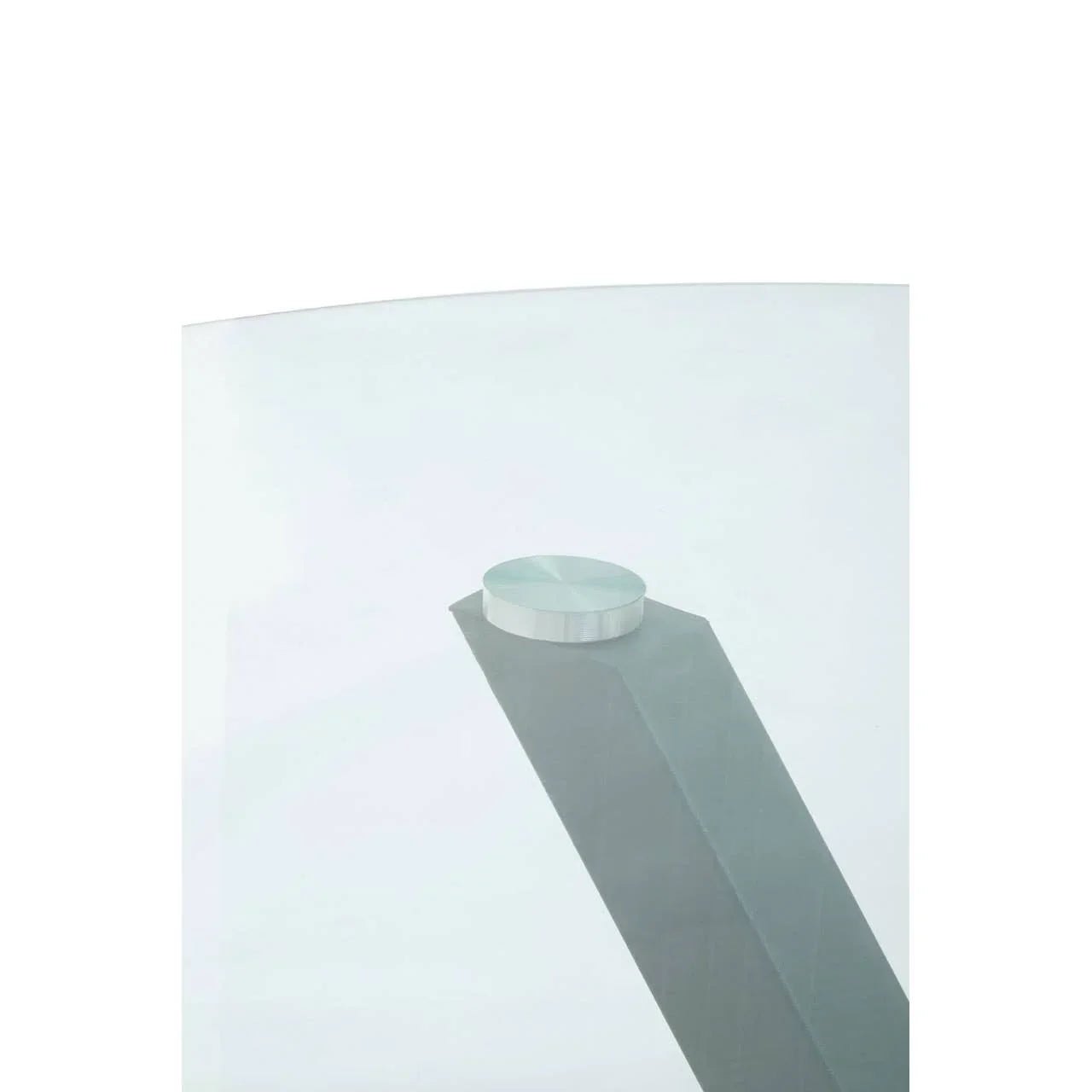 Close up of metal support and glass tabletop on modern dining table