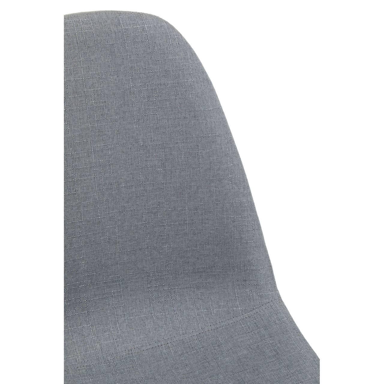 Closeup of grey fabric dining chair backrest with textured upholstery