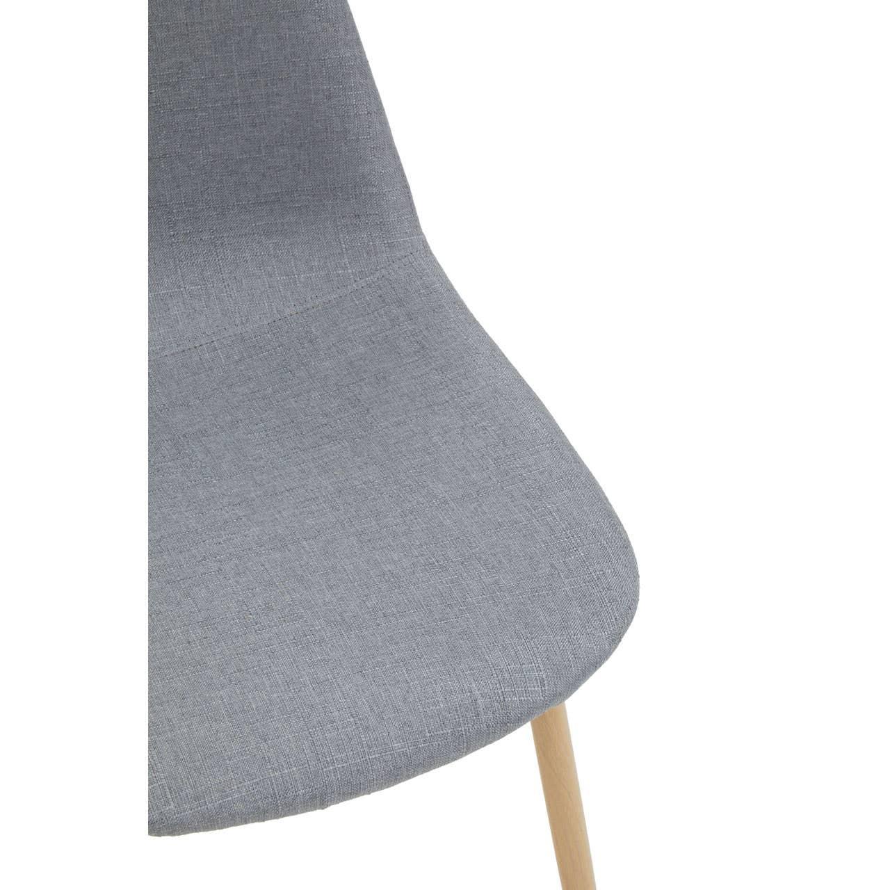 Grey fabric dining chair seat with light wooden leg close-up