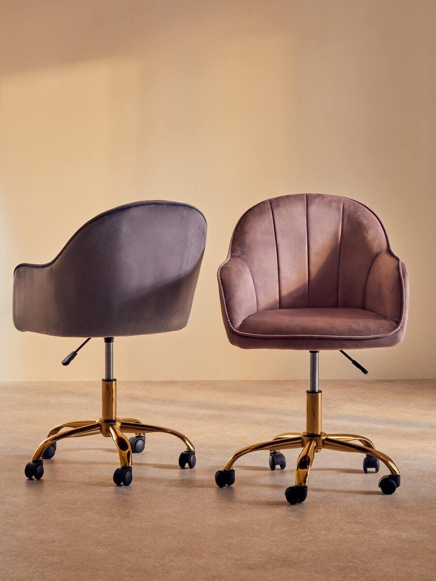 Velvet office chairs with gold swivel bases on castors in neutral setting, front and back view