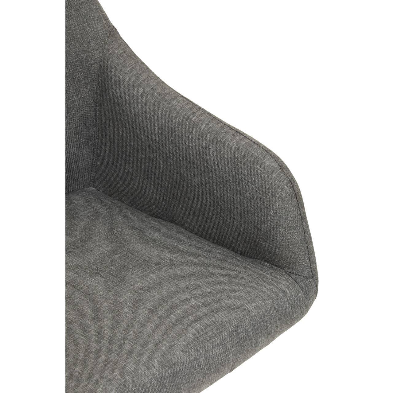 Close-up of grey fabric dining chair seat with padded armrest and curved backrest