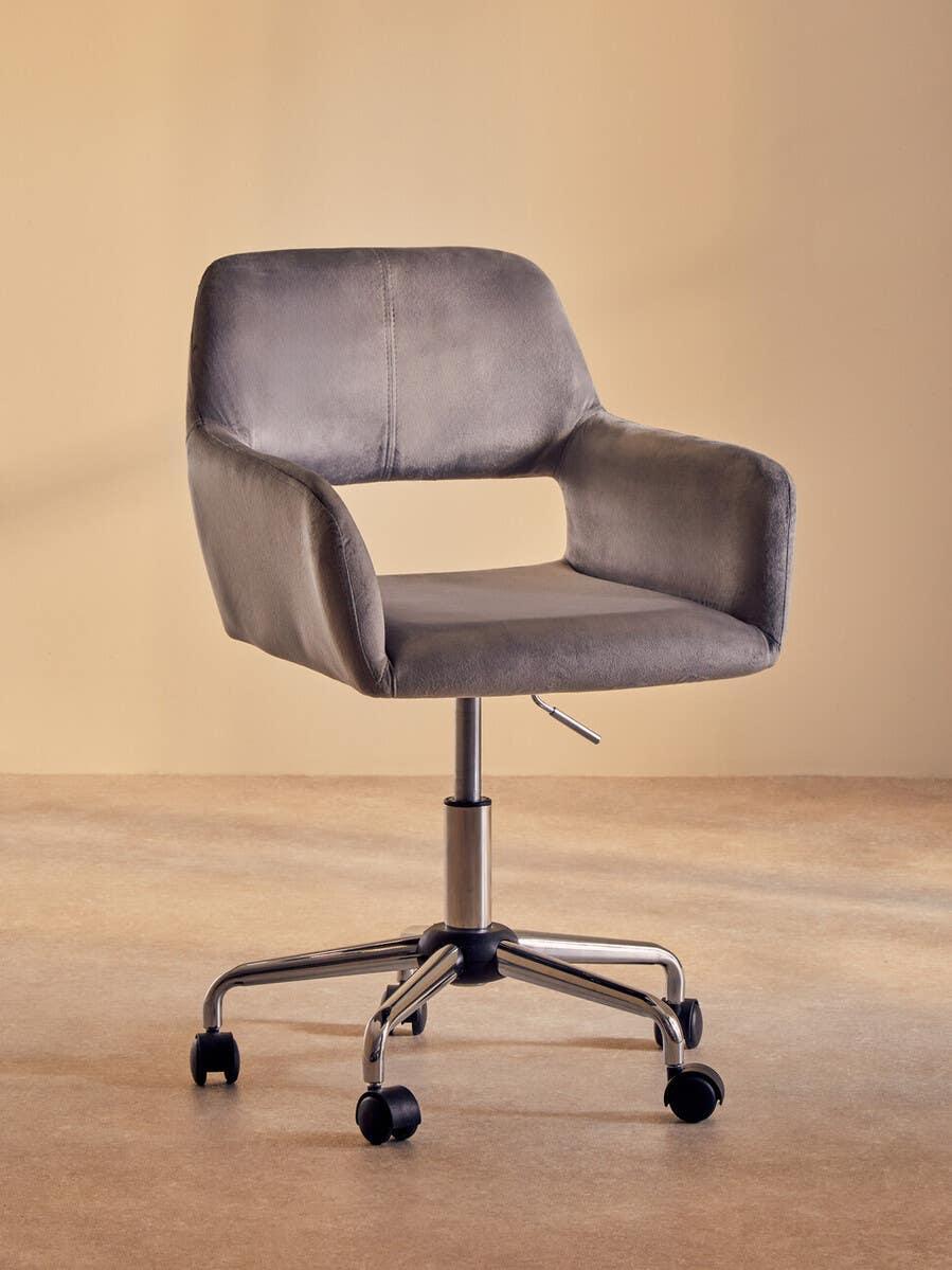 Grey swivel office chair with cushioned seat and armrests on chrome base with wheels