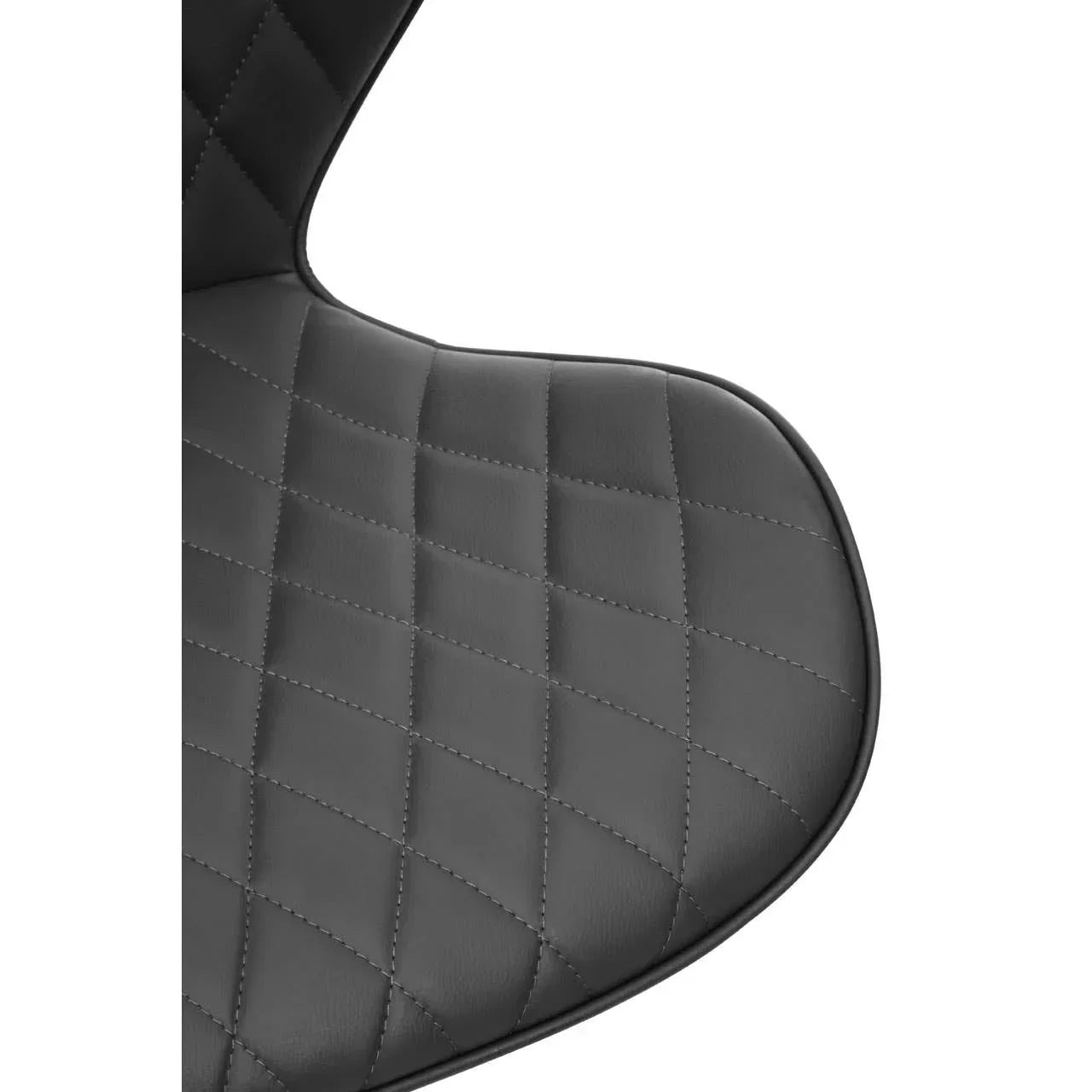 Close view of black dining chair seat with quilted stitching detail