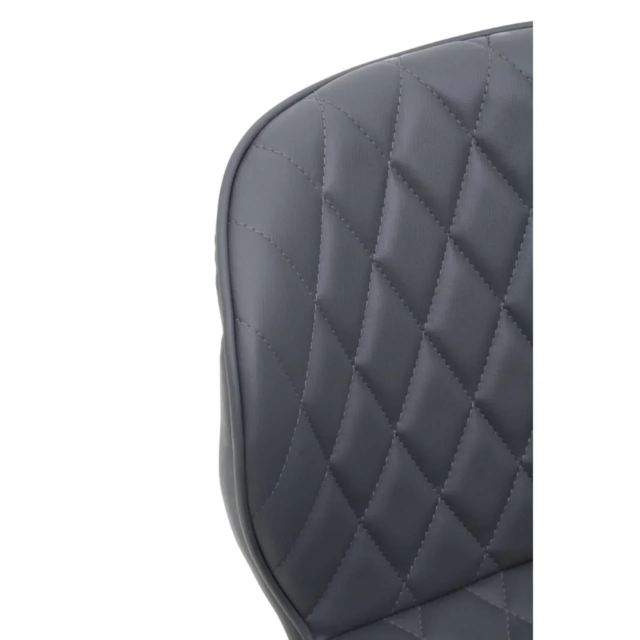 Close-up of grey quilted dining chair back with diamond stitching pattern