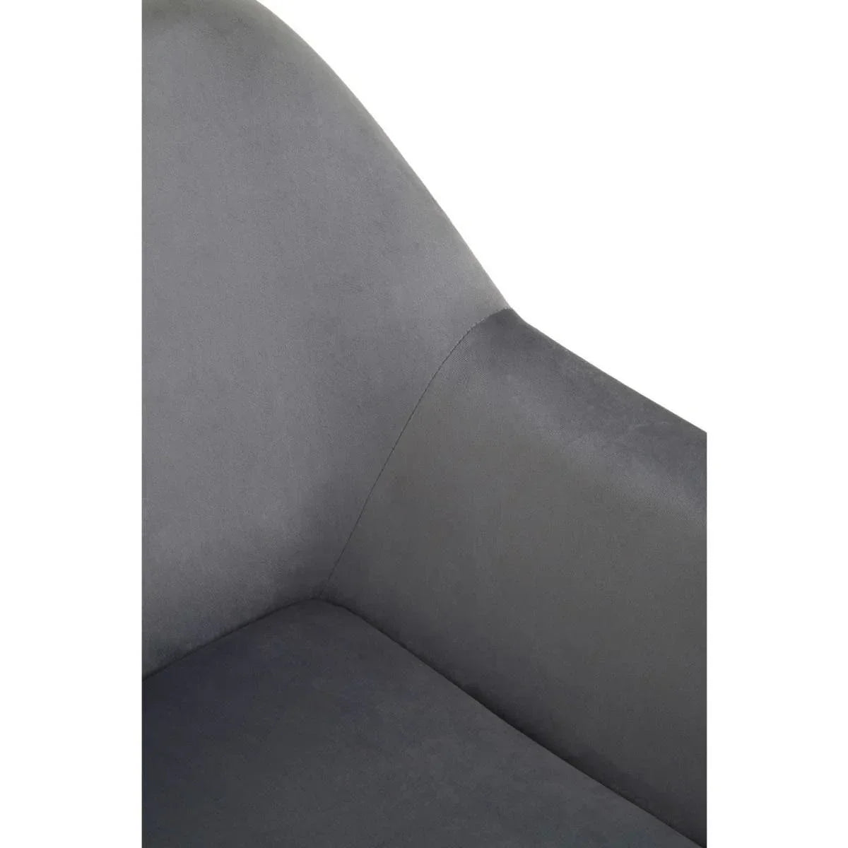 Close-up view of grey fabric dining chair seat and curved backrest