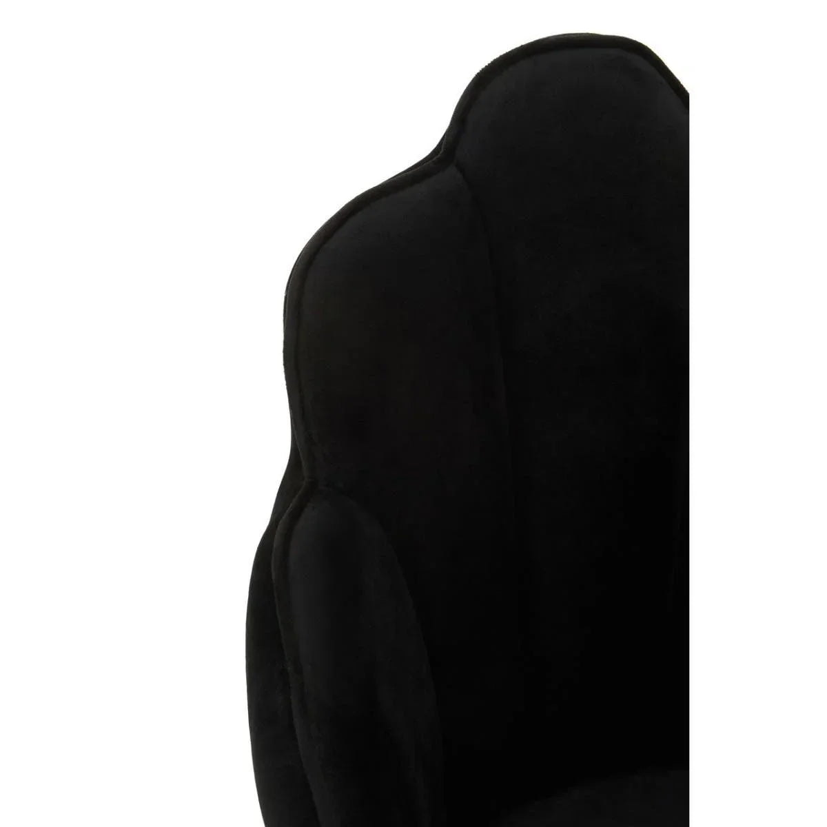 Close-up of black velvet chair backrest with curved contour design