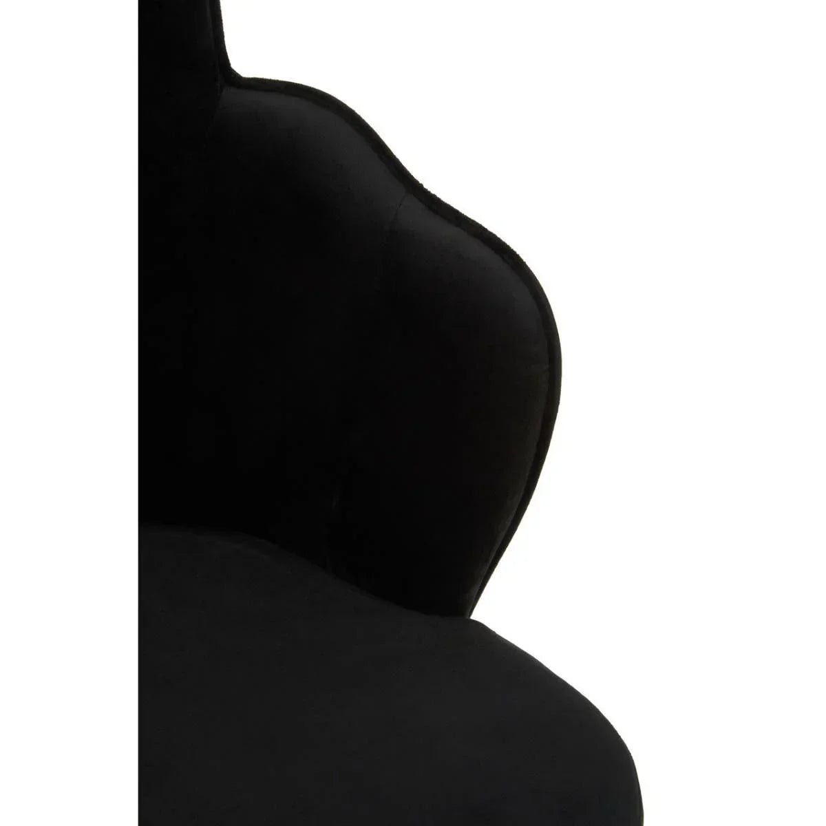 Curved black velvet chair backrest and seat close-up