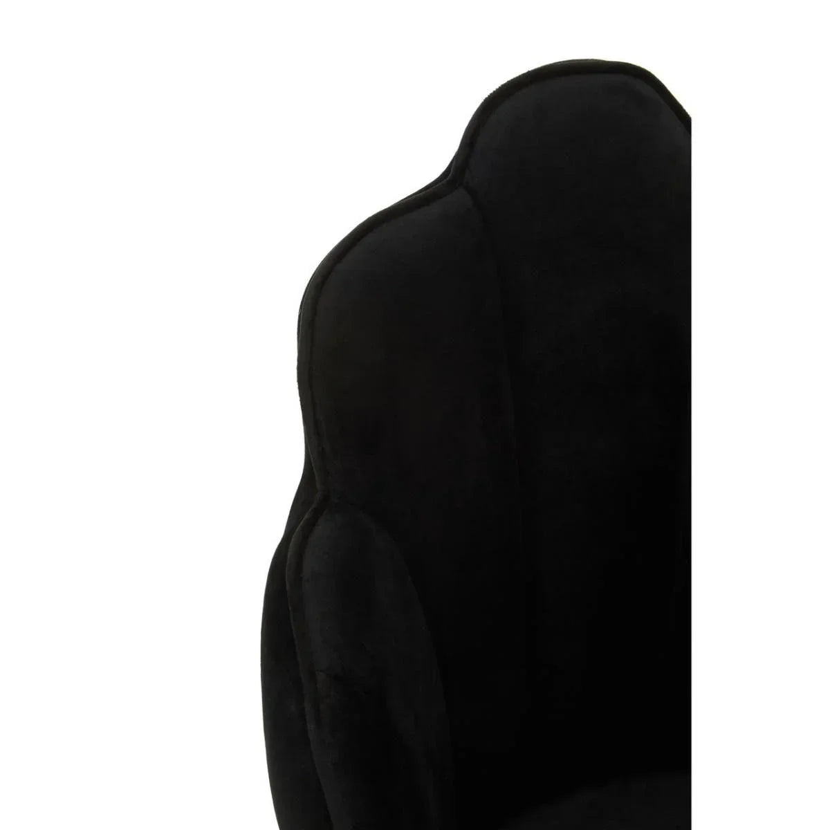 Curved black velvet armchair backrest closeup showing plush upholstery detail