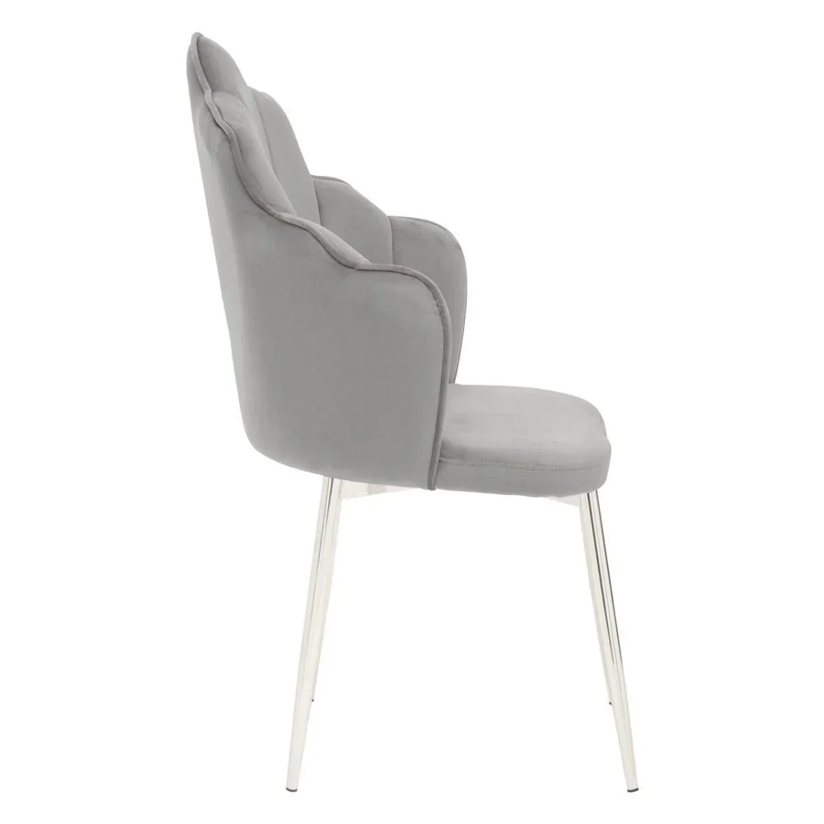 Side view of grey velvet dining chair with padded backrest and chrome legs