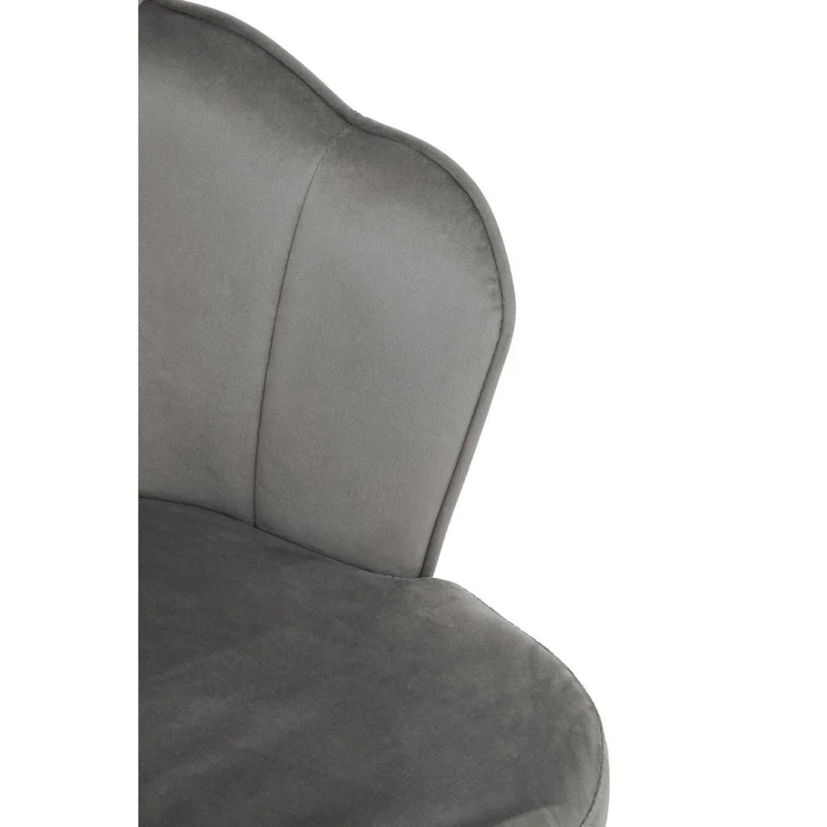 Close-up of grey velvet dining chair seat and curved backrest