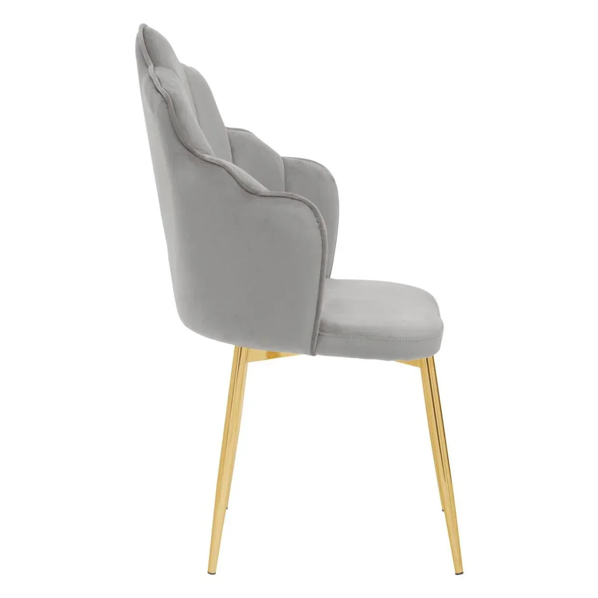 Grey velvet dining chair with padded seat and gold metal legs, side profile view