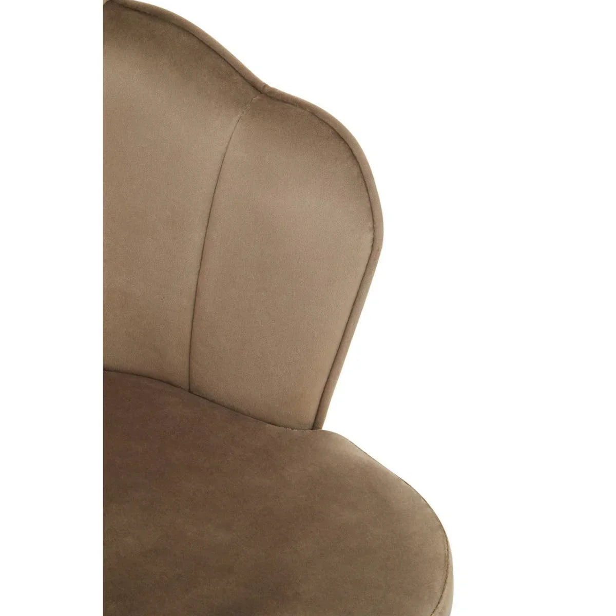 Closeup of brown velvet dining chair with curved backrest and stitched panel detailing