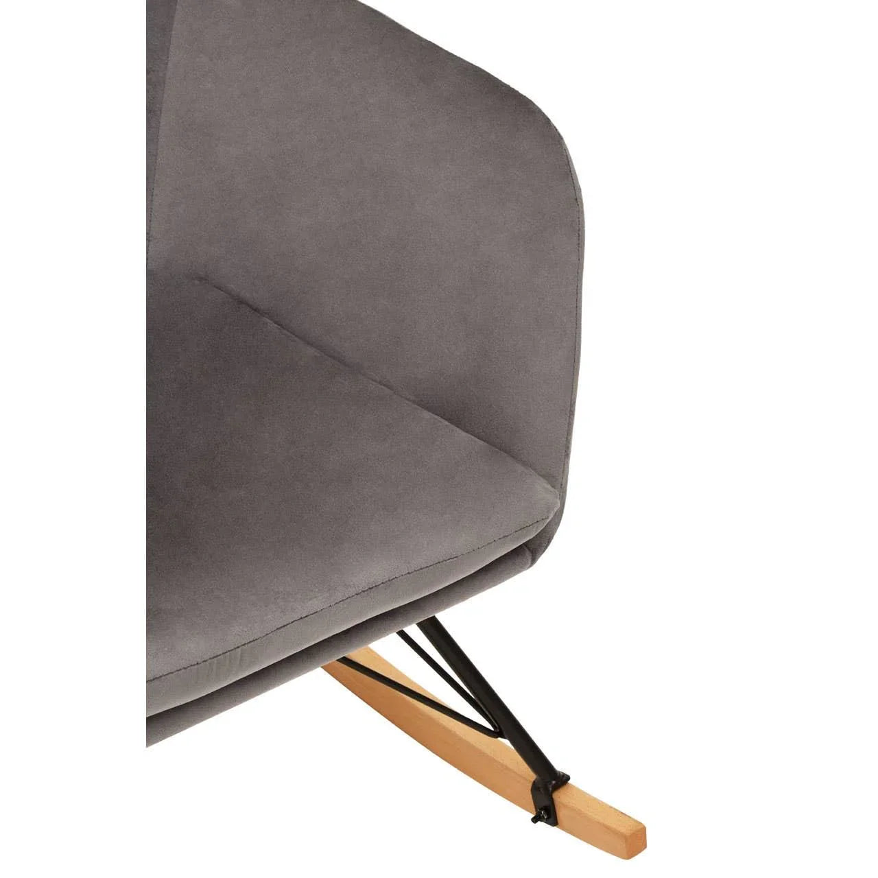 Close-up of grey fabric armchair seat with wooden rocking leg and black metal support