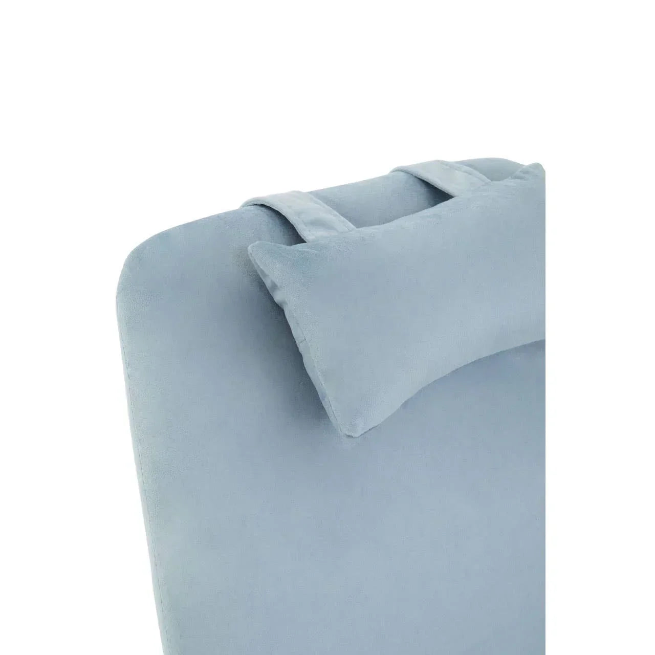 Light blue fabric chaise lounge with matching pillow and headrest detail