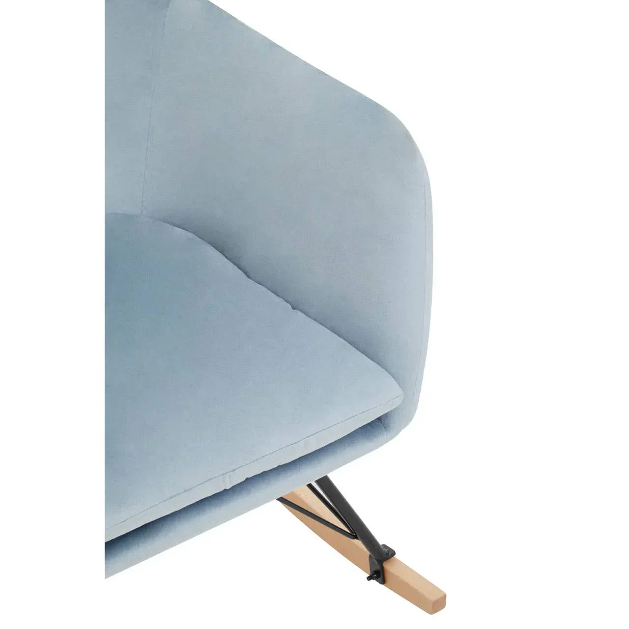 Light blue fabric armchair with metal and wooden leg detail, close-up of seat and arm
