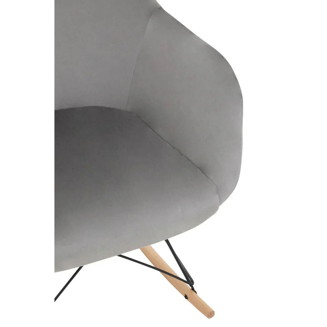 Grey upholstered armchair with wooden legs and metal supports, partial close-up view