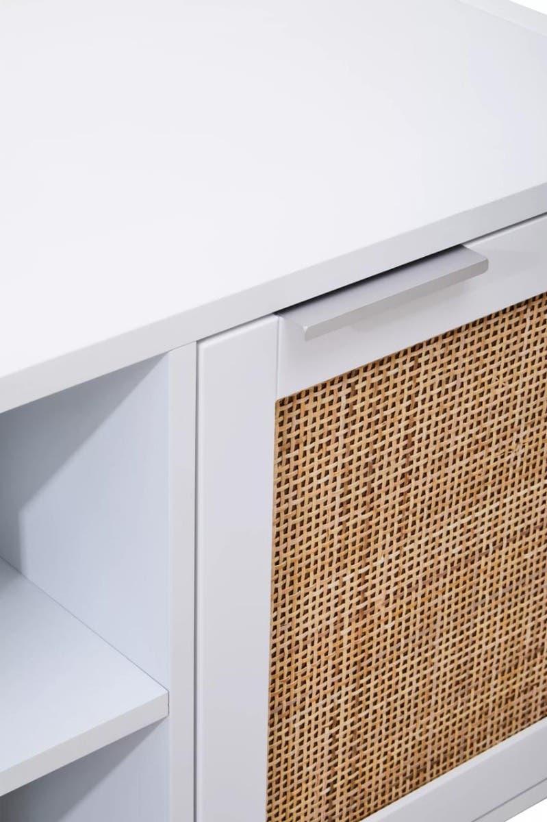 White sideboard with rattan door panel and metal handle, close view of storage cabinet
