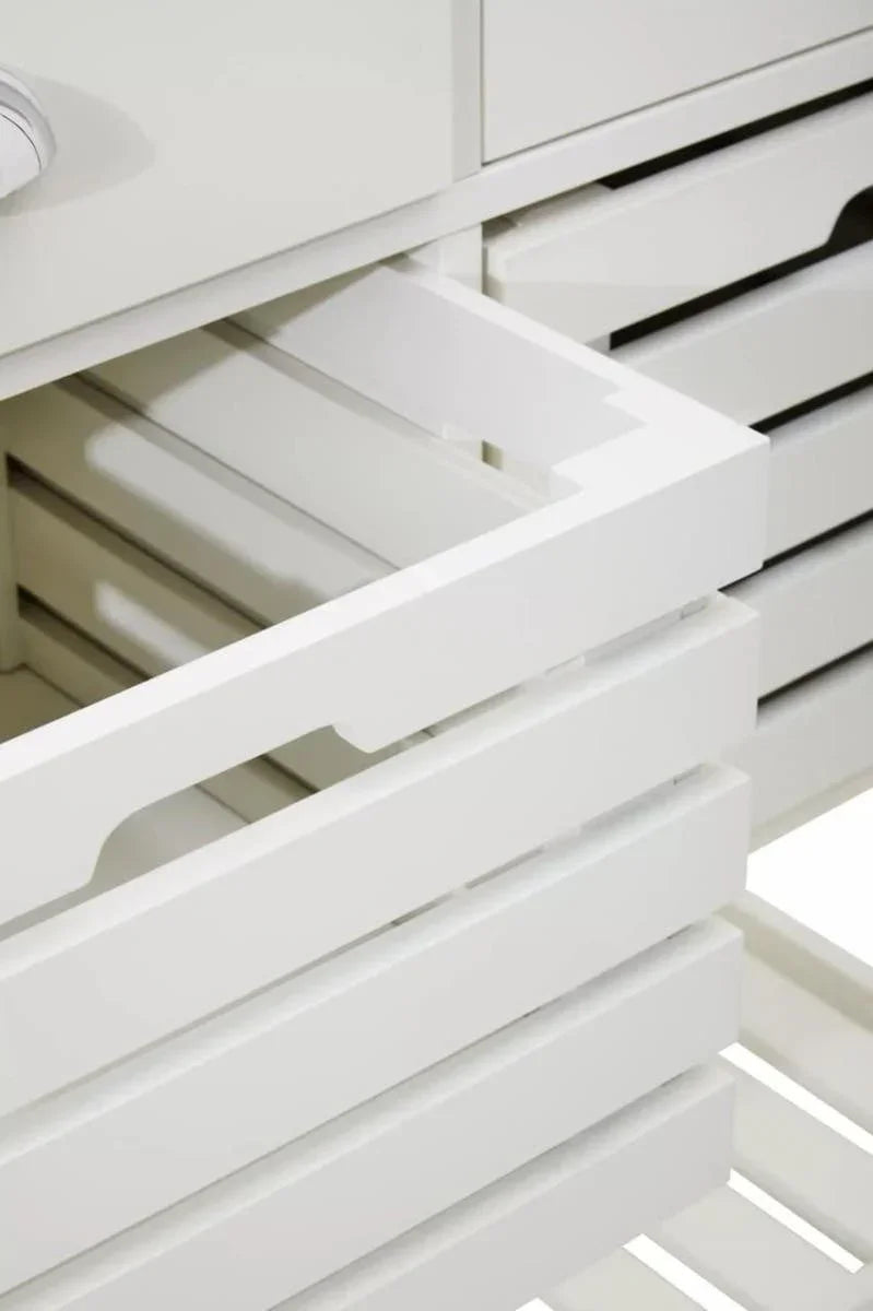 White wooden storage unit with slatted pull-out drawers and smooth finish