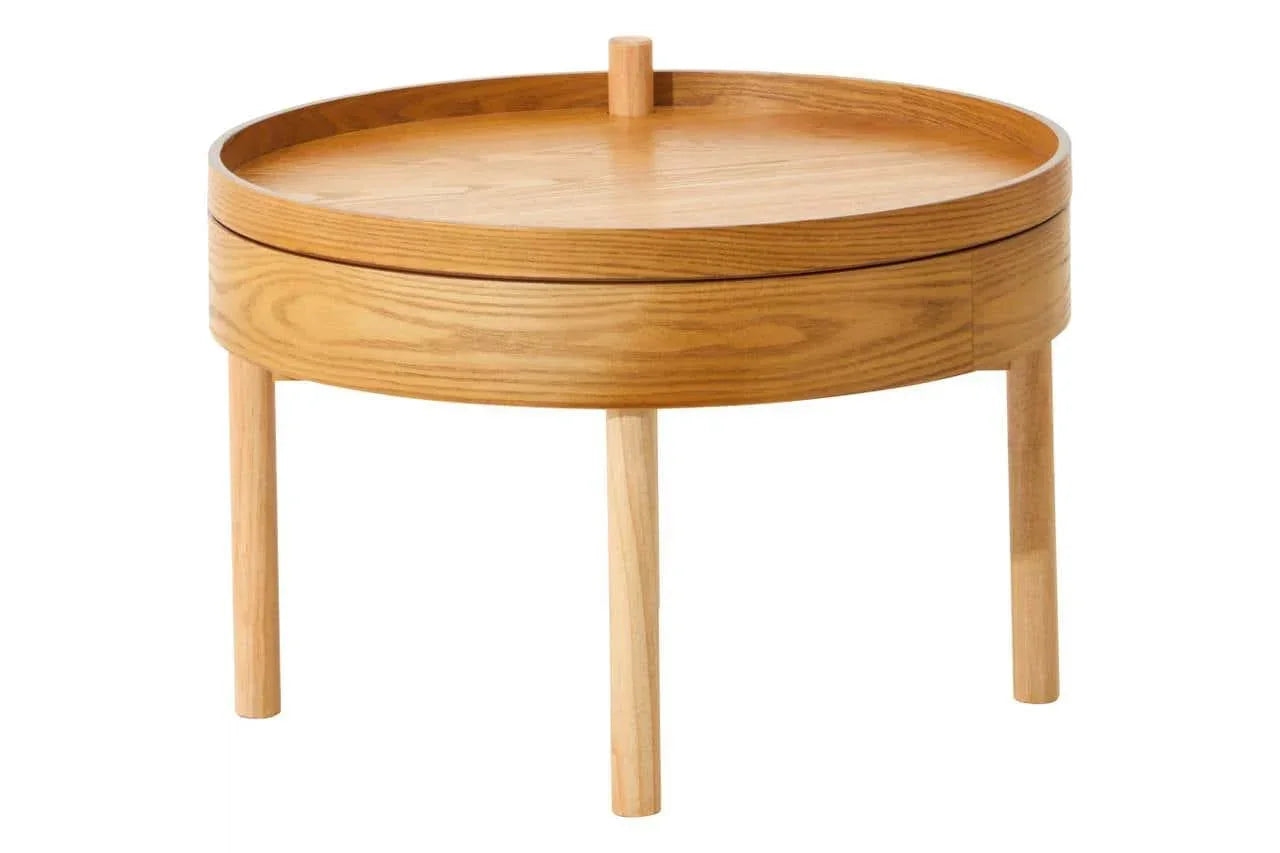 Round oak side table with raised edge and three legs, viewed from the front angle