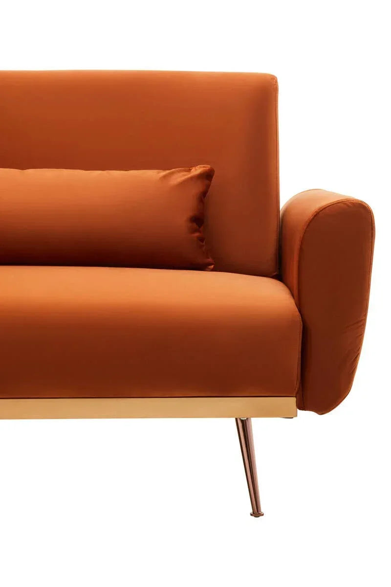 Modern orange sofa with cushion, gold trim, and metal legs, front arm detail view